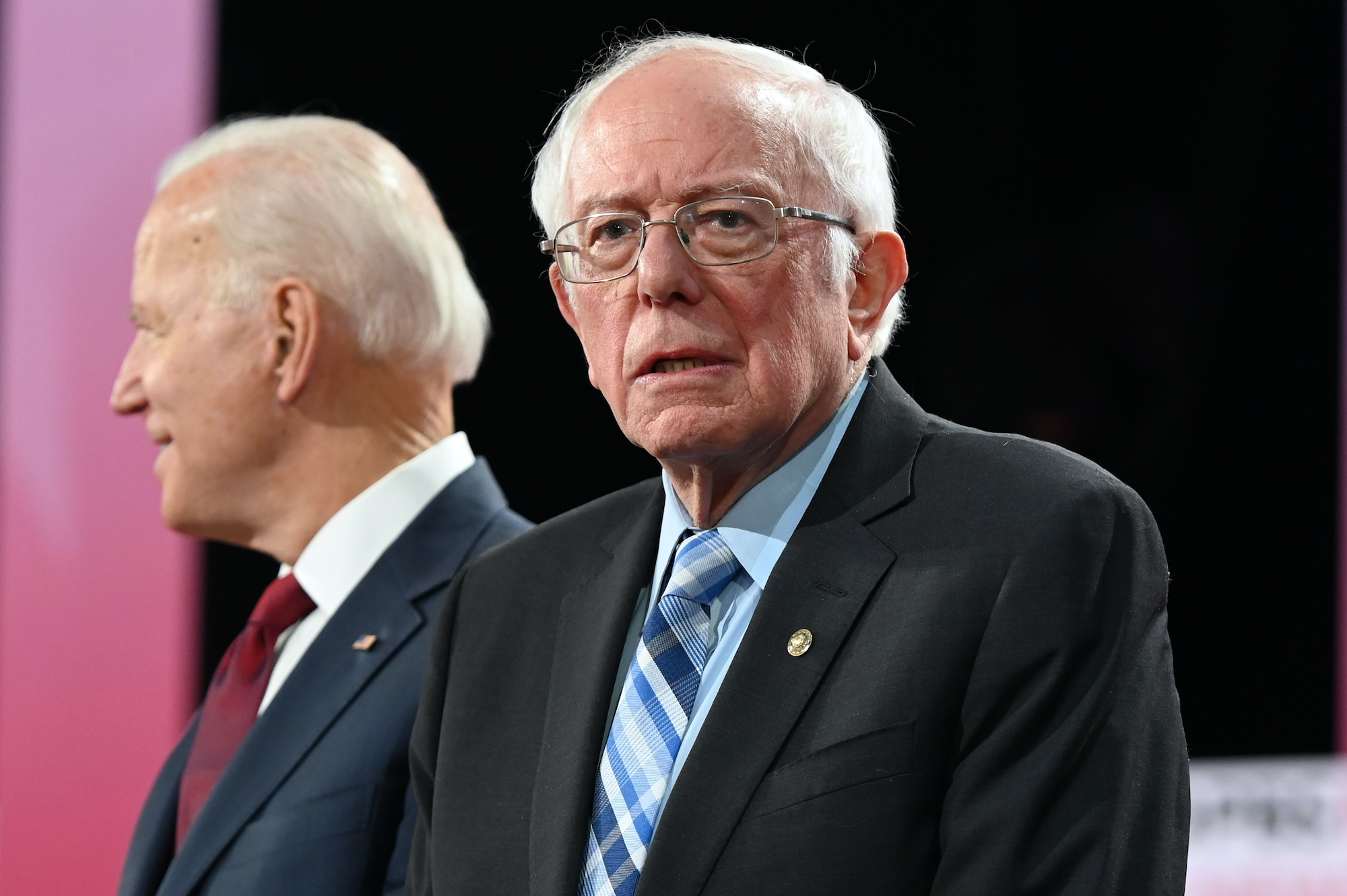 Democratic presidential hopefuls former Vice President Joe Biden and Vermont Senator Bernie Sanders arrive on stage ahead of the sixth Democratic primary debate of the 2020 presidential campaign season co-hosted by PBS NewsHour &amp; Politico at Loyola Marymount University in Los Angeles, California on December 19, 2019. Photo: Robyn Beck/Getty Images
