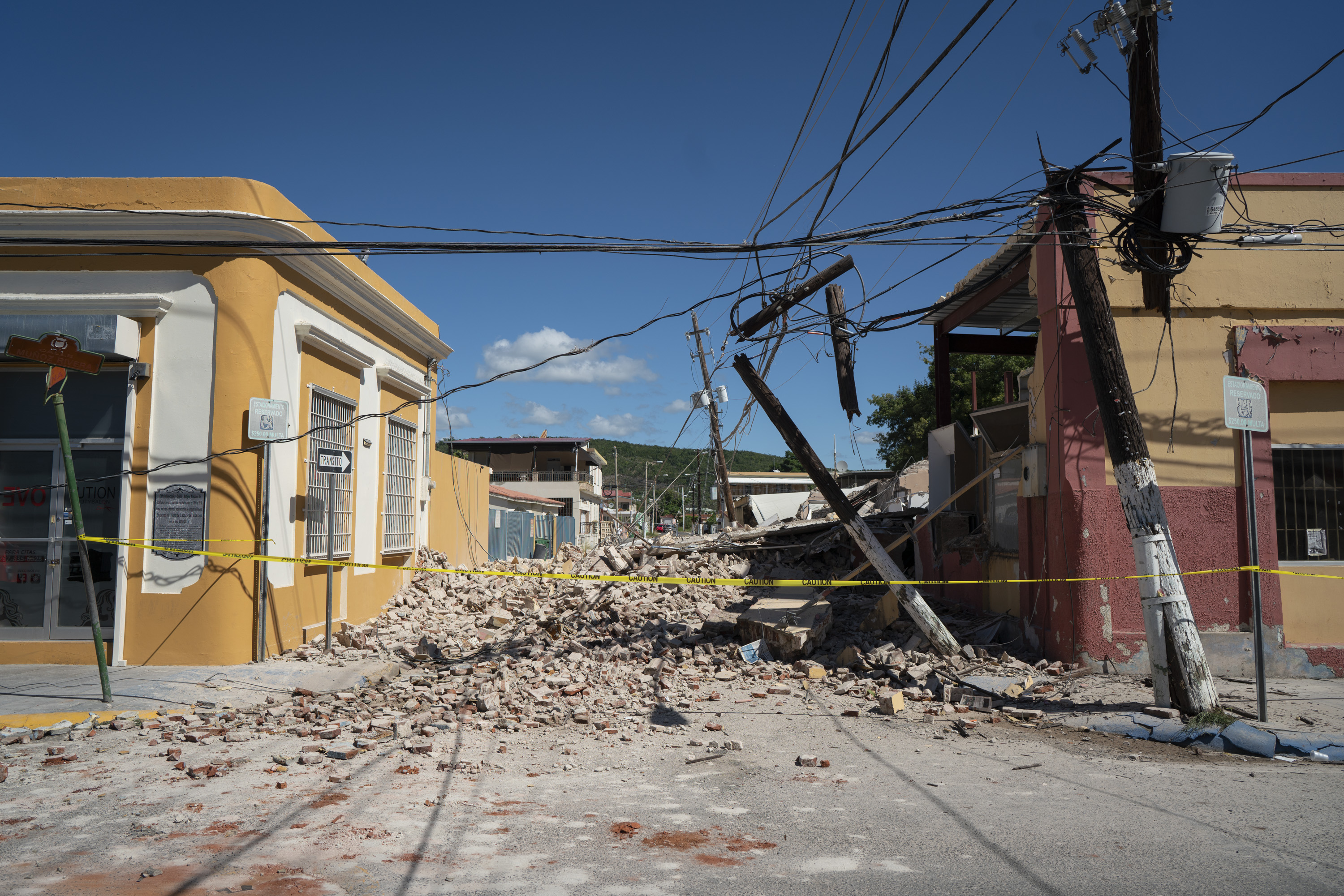 GUAYANILLA, PUERTO RICO - JANUARY 7: Rubble covers the street after a 6.4 earthquake hit just south of the island on January 7, 2020 in Guayanilla, Puerto Rico. This morning's earthquake was preceded by a series of smaller quakes in the south of the island with the epicenter in Guánica. (Photo by Eric Rojas/Getty Images)