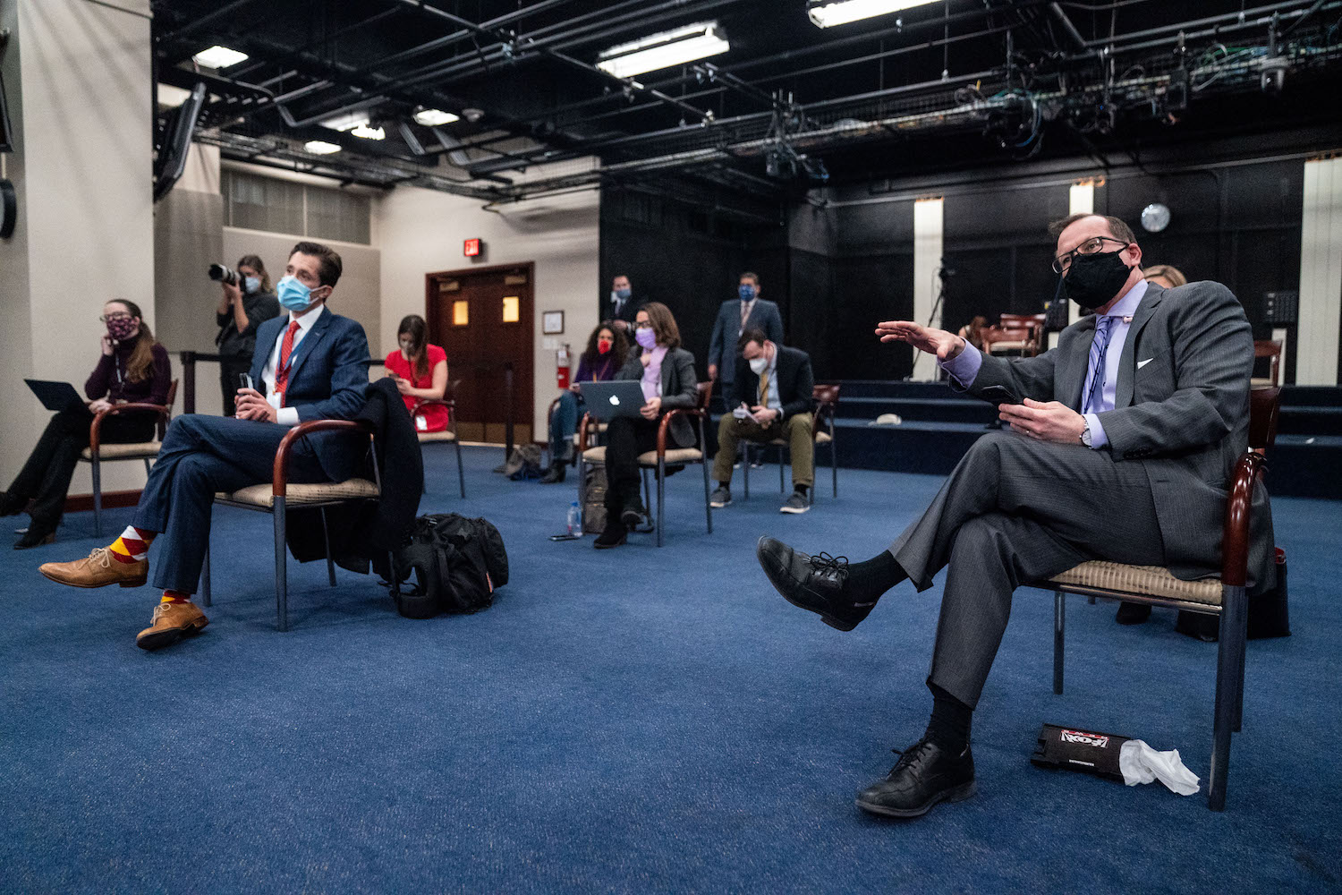 The main story here is how antiquated media rules are gatekeeping outlets of Color from having access to report in Congress. Photo: Reporters, sitting socially distant, ask Speaker of the House Nancy Pelosi (D-CA) questions during a weekly press conference on Capitol Hill on Thursday, Feb. 25, 2021 in Washington, DC. Photo: Kent Nishimura/ Los Angeles Times via Getty Images. 