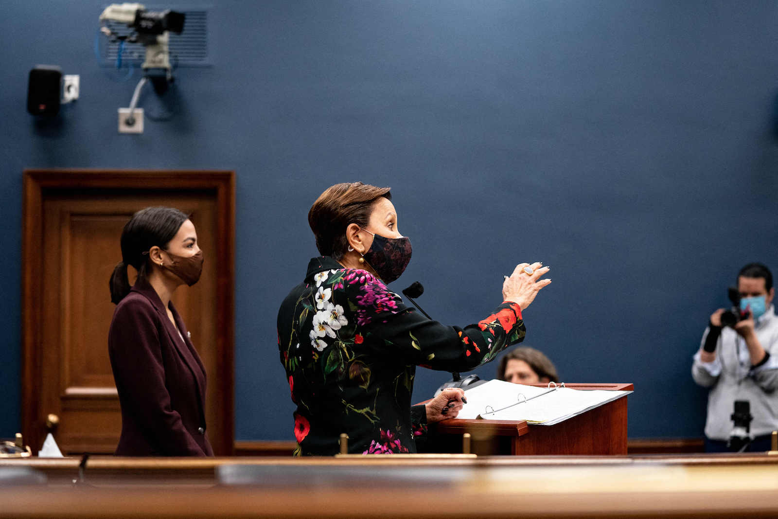 U.S. Representative Alexandria Ocasio-Cortez (D-NY), listens to U.S. Representative Nydia Velázquez (D-NY) speak during a press conference for the announcement of the bicameral introduction of the Puerto Rico Self-Determination Act of 2021 on Capitol Hill in Washington March 18, 2021. (Photo by Anna Moneymaker / POOL / AFP) (Photo by ANNA MONEYMAKER/POOL/AFP via Getty Images) 
