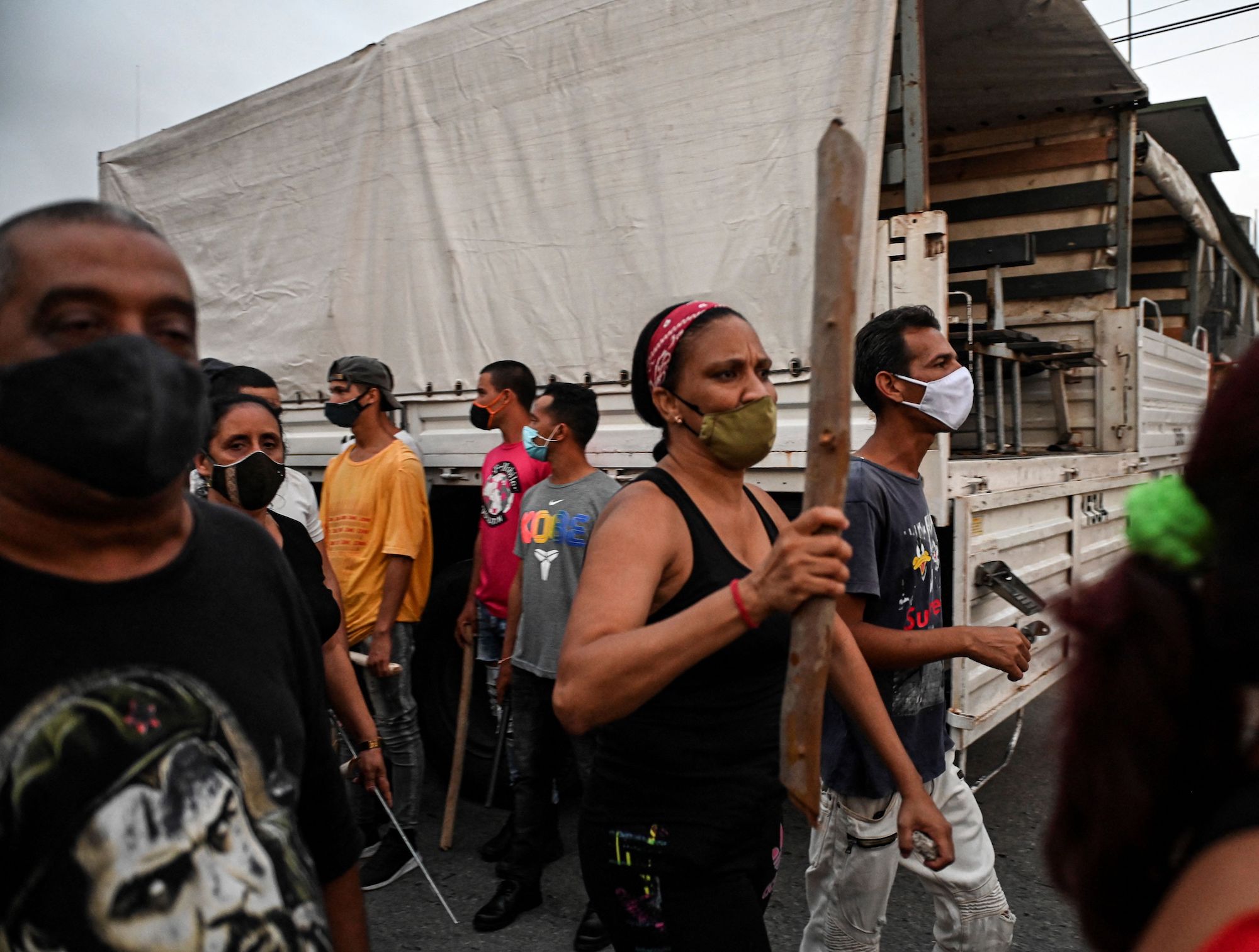 Cubans take part in a demonstration in support of Cuban President Miguel Diaz-Canel's government in Arroyo Naranjo Municipality, Havana on July 12, 2021. Photo: Yamil Lage/AFP via Getty Images.
