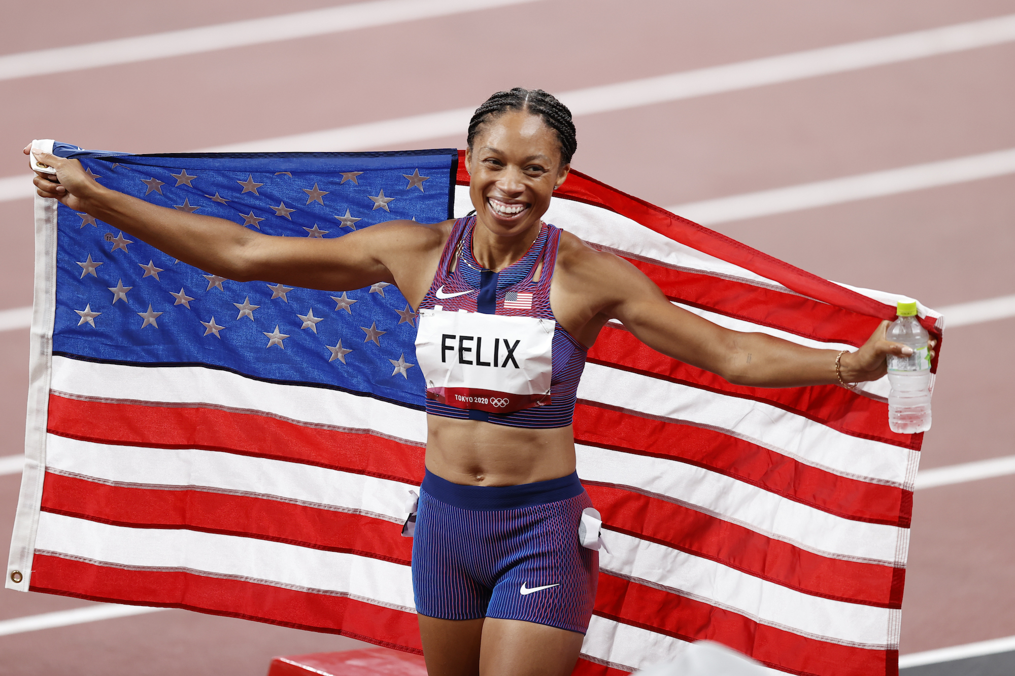 Bronze medalist Allyson Felix of Team USA celebrates after competing in the Women's 400m on day fourteen of the Tokyo 2020 Olympic Games at Olympic Stadium on August 06, 2021 in Tokyo, Japan. Photo: Fred Lee/Getty Images