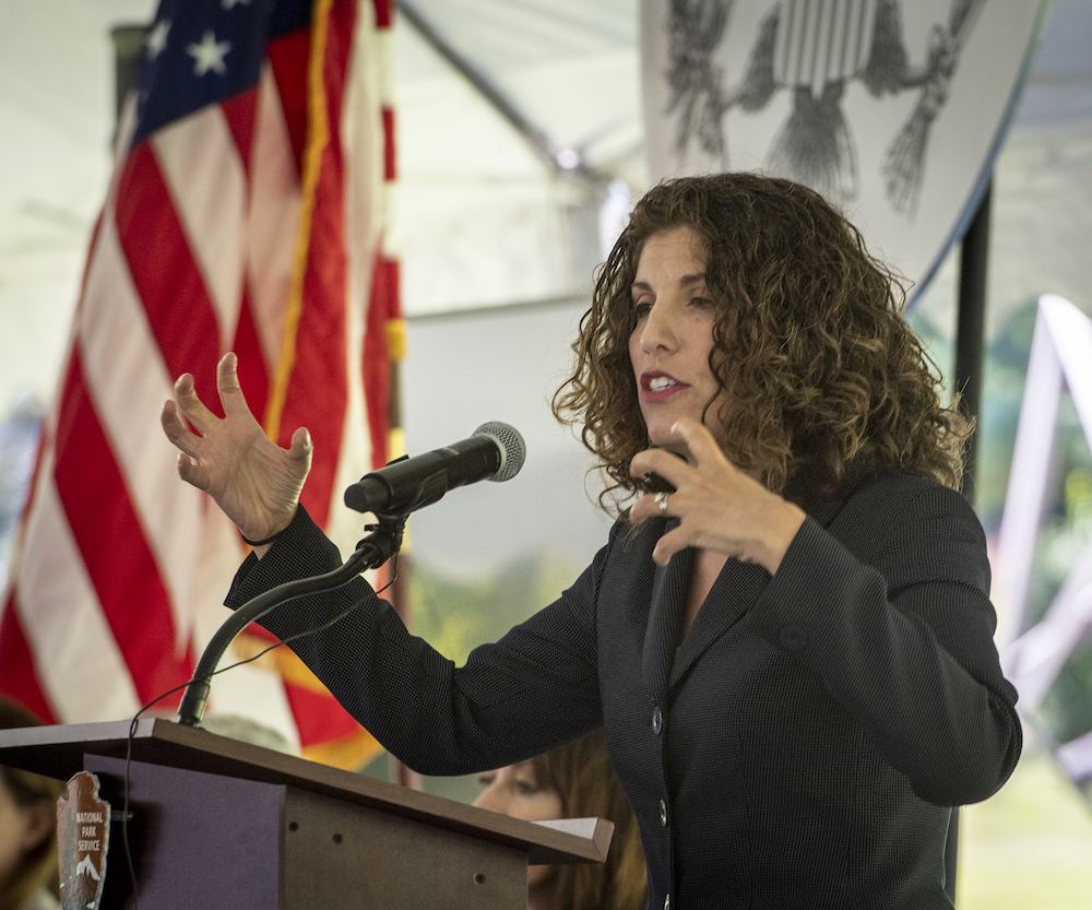 Myrna Perez, Director of the Brennan Center's Voting Rights and Elections Program, speaking to the packed house of immigrants, family, friends and officials during the annual naturalization ceremony in celebration of Constitution and Citizenship Day at the Sagamore Hill National Historic Site in Oyster Bay, New York on September 17, 2019. Photo: John Conrad Williams Jr./Newsday RM via Getty Images
