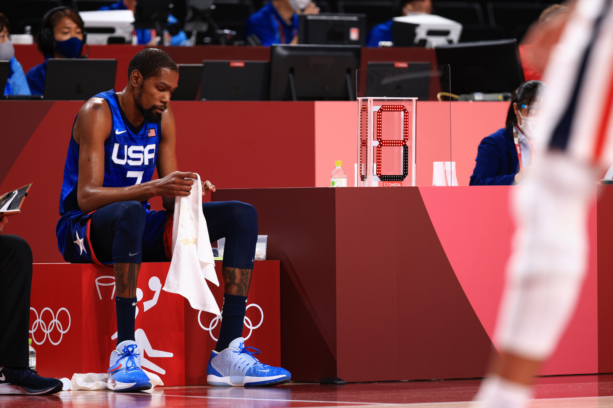 Kevin Durant #7 of Team United States sits on the bench in disappointment as time winds down in the United States' loss to France in the Men's Preliminary Round Group B game on day two of the Tokyo 2020 Olympic Games at Saitama Super Arena on July 25, 2021 in Saitama, Japan. Photo: Mike Ehrmann/Getty Images