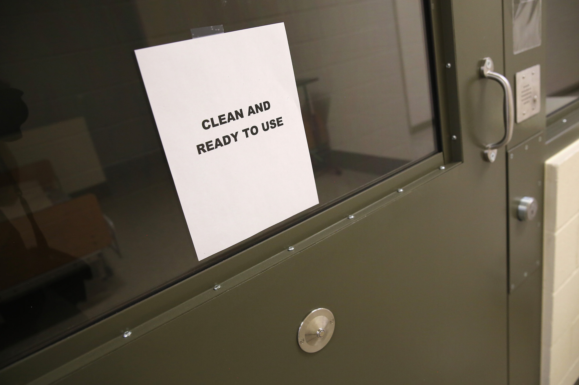 A medical quarantine cell awaits a new patient at the Adelanto Detention Facility on November 15, 2013 in Adelanto, California. Photo: John Moore/Getty Images.