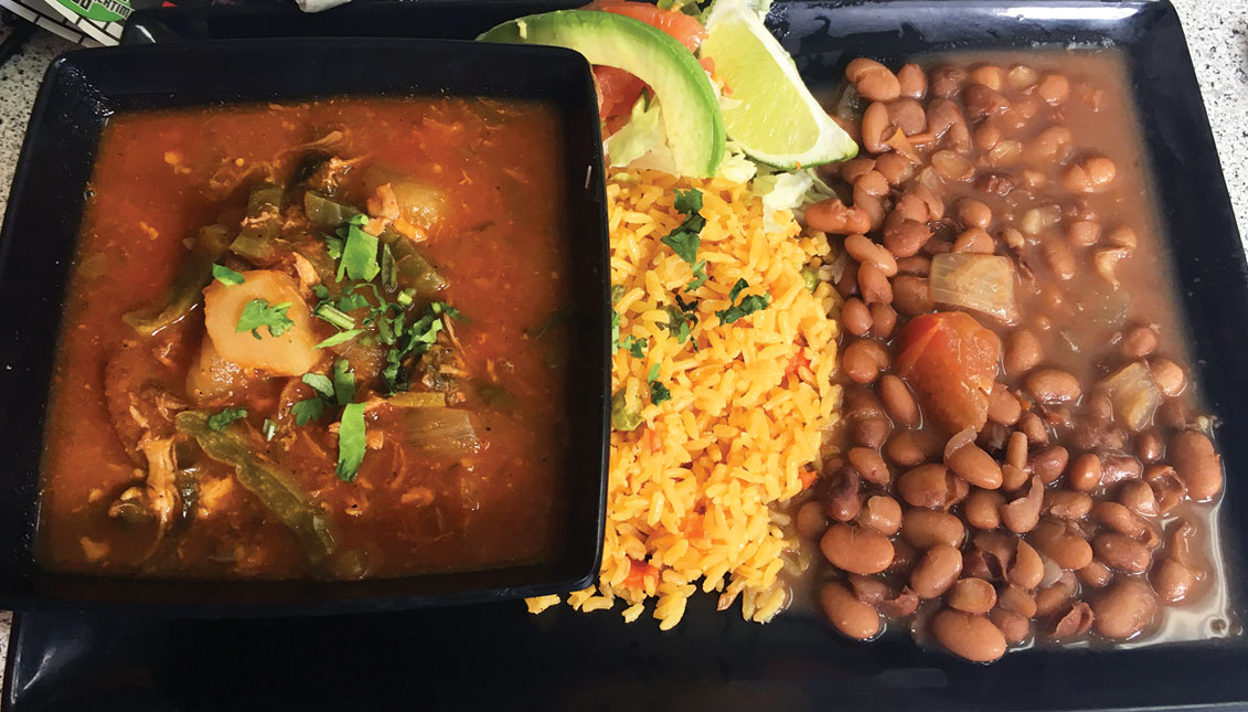 Guisado with rice and beans. Photo: Eli Siegel