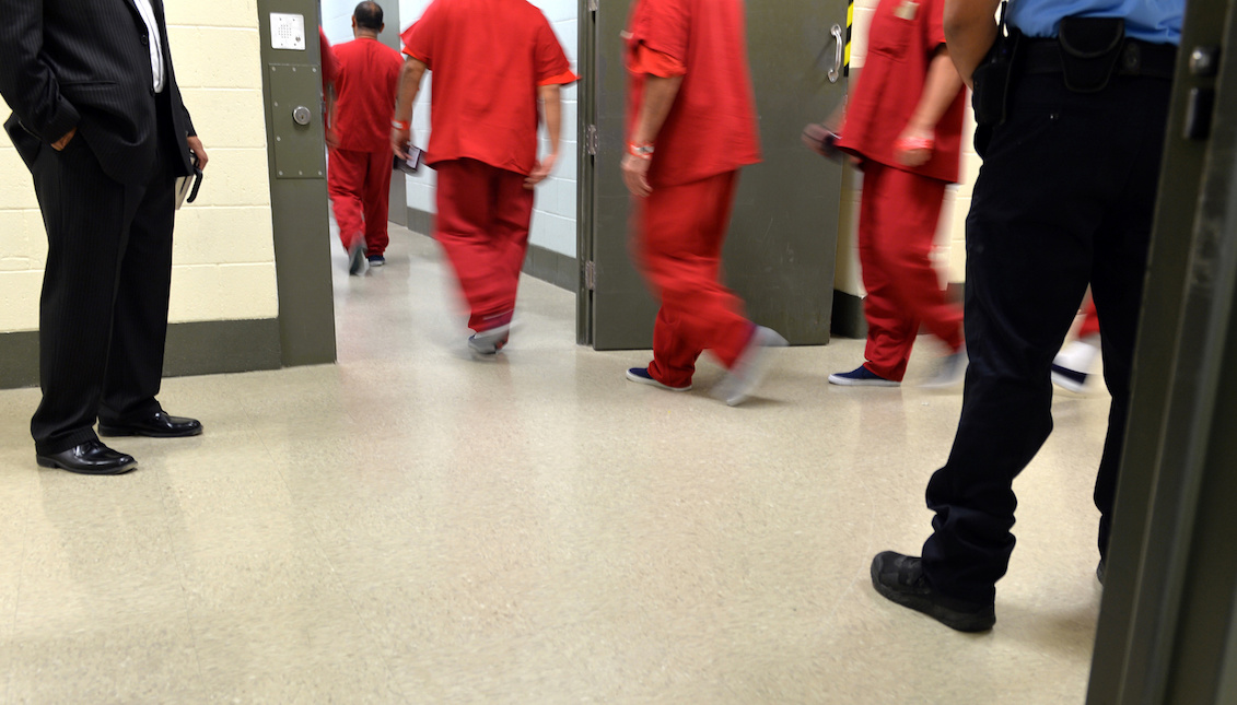 Detainees make their way through a hallway at the Adelanto Ice Processing Center, the largest immigration detention center in California, on Thursday, August 17, 2017 in Adelanto, Ca. (Micah Escamilla, Press Enterprise/SCNG)