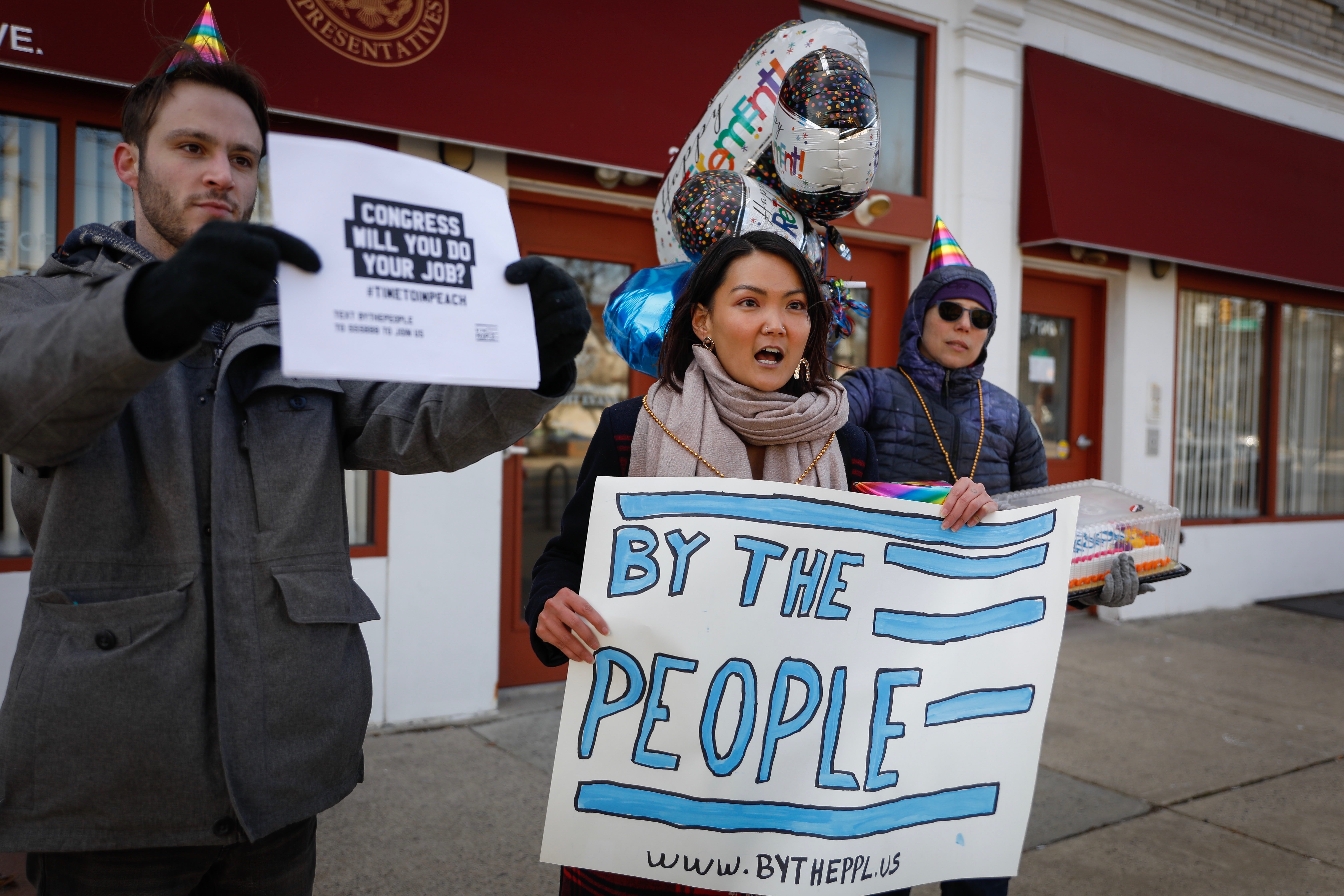 Activists organize outside Congressman Dwight Evans’ office. Photo: Rachael Warriner, By The People.