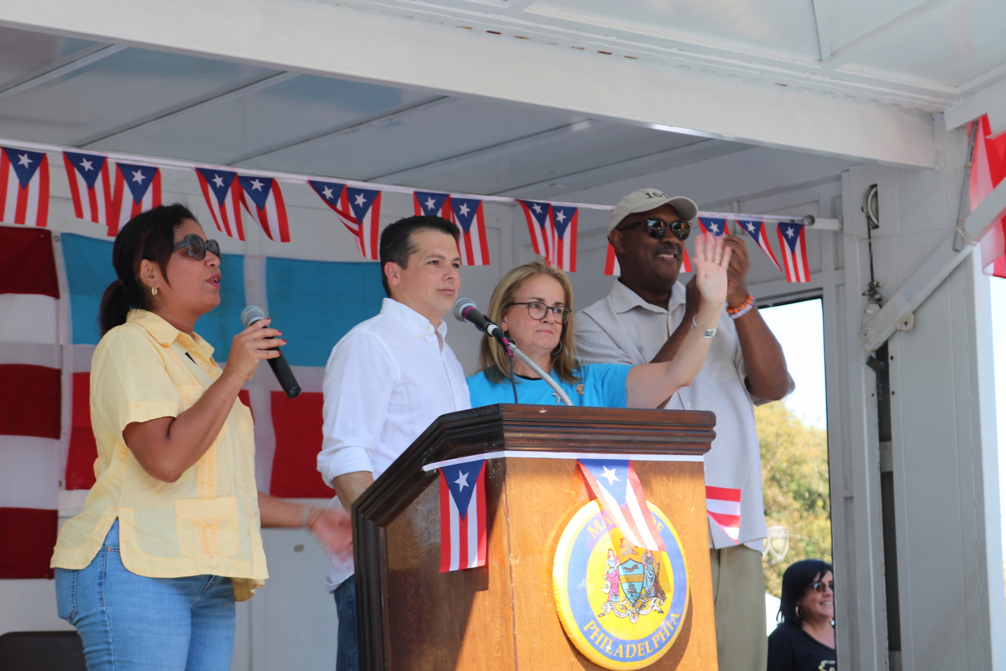 Councilwoman María Quiñones-Sánchez (Left) speaks at the 2019 People's March for Puerto Rico in Philadelphia. Photo: Nigel Thompson, AL DÍA.
