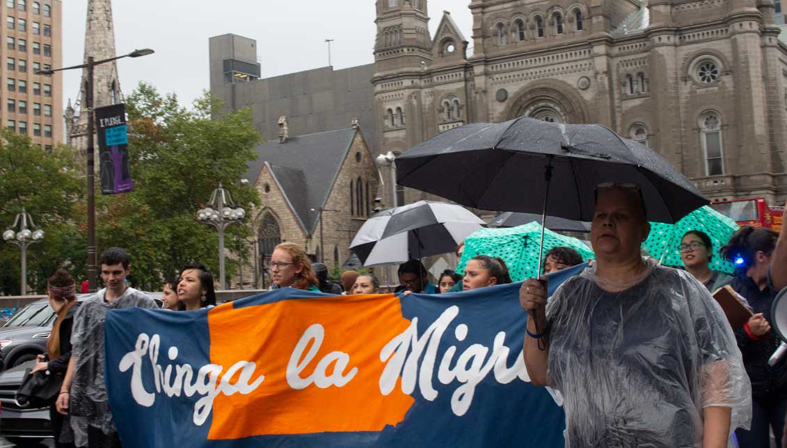 Demonstrators march in Philadelphia on Sept. 25 in protest of Gov. Tom Wolf's lack of action on immigration issues. Photo: David Maas / AL DÍA News
