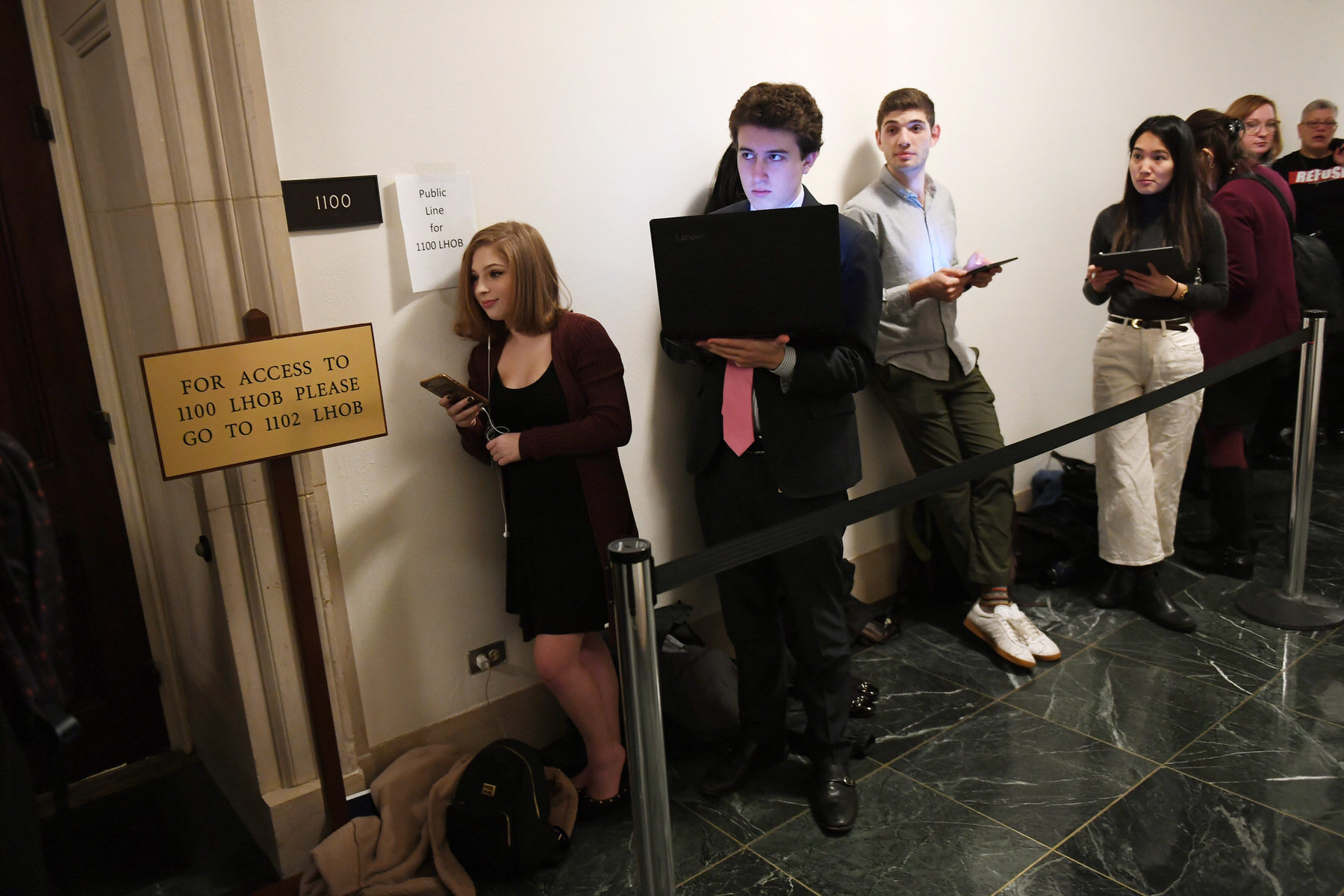 Congressional interns wait in line, December 2019. Photo Credit: Matt McClain/The Washington Post. Getty Image.