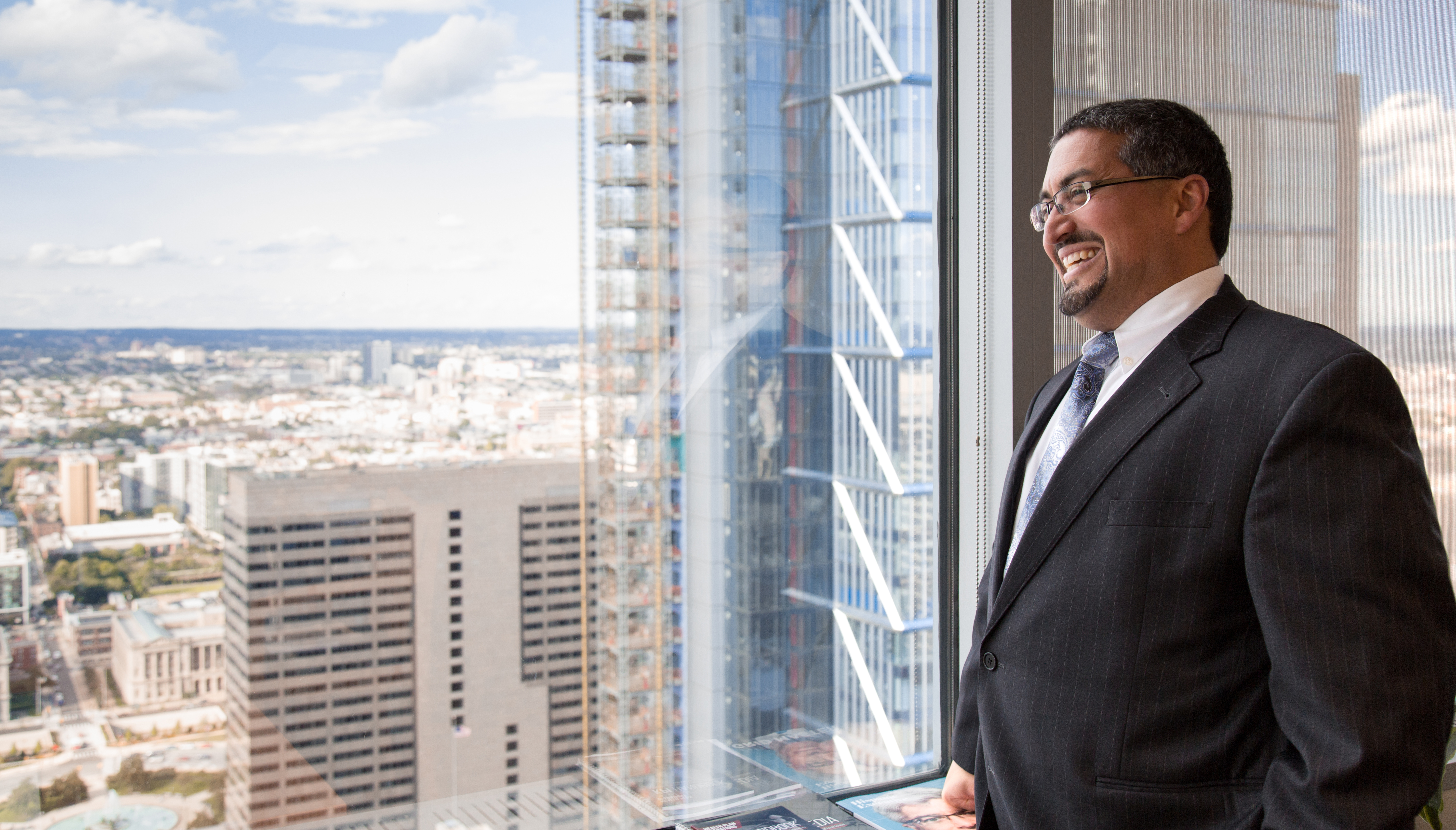 Juan López at his office in Independence Blue Cross. Samantha Laub / AL DÍA News