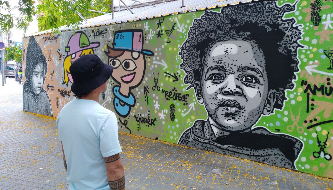 DJ LU/Juegasiempre began his career as an urban artist in Bogotá, Colombia. He uses his murals to draw the attention to social injustice issues, such as poverty, immigration rights and corruption. His last commissioned mural was in Barcelona, Spain. Photo: A.R   
