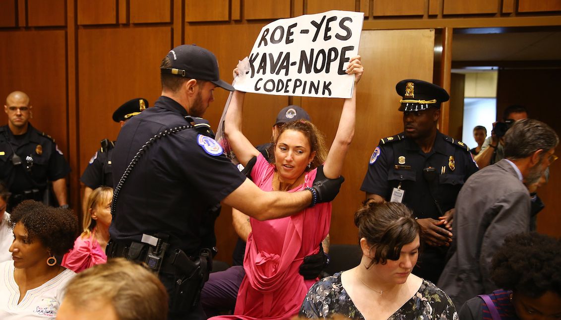 A woman initiates a protest while the conservative Brett Kavanaugh, candidate of the president of the United States, Donald Trump, to become judge of the Supreme Court, prepares to testify at the beginning of the hearings held for confirmation, in the Hart Senate Office Building of Washington DC, September 4, 2018. EFE/TASOS KATOPODIS