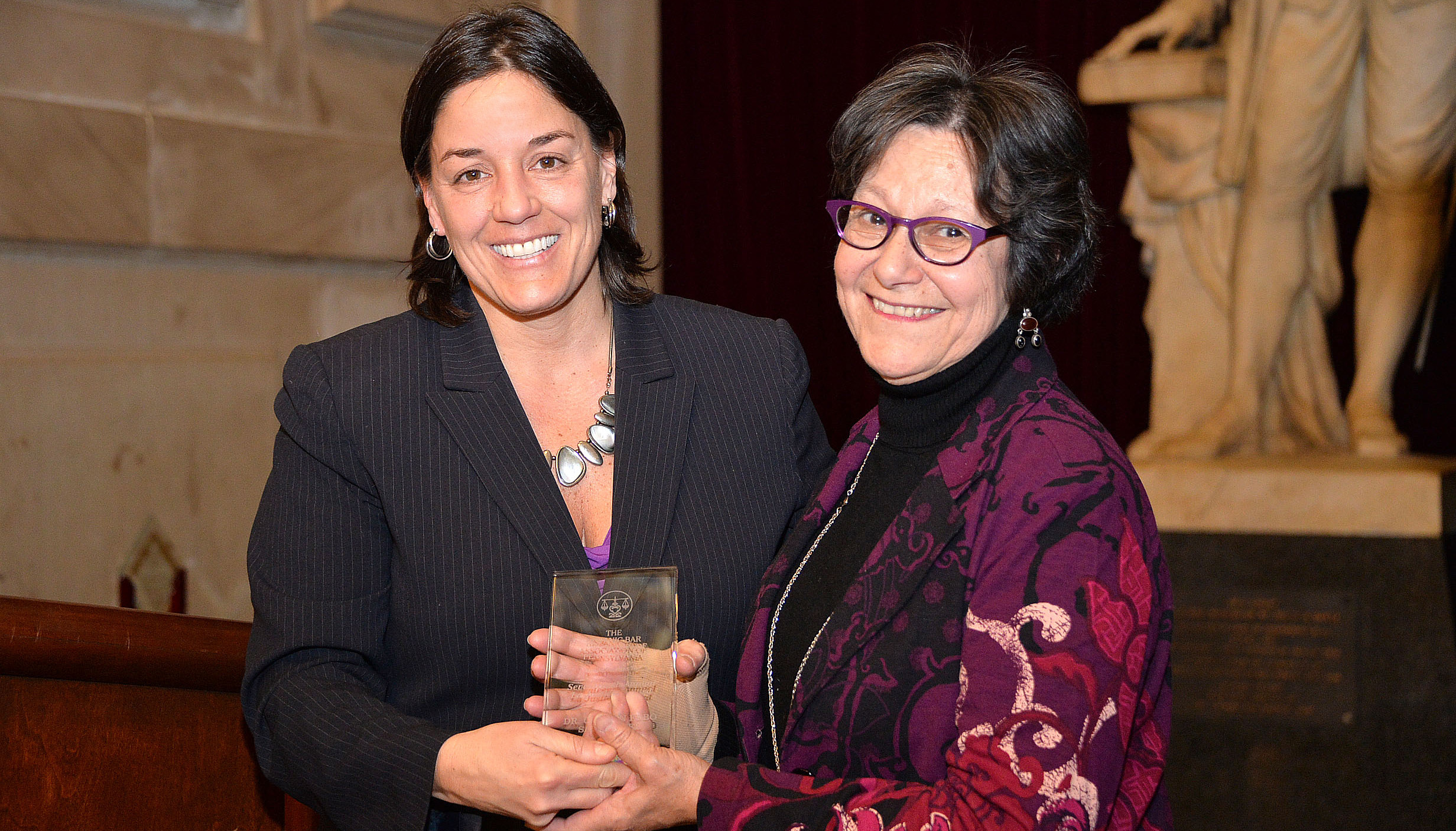 Jacqueline Romero and Dr. Carmen Febo-San Miguel. Photographed by Peter Fitzpatrick for AL DÍA News. 