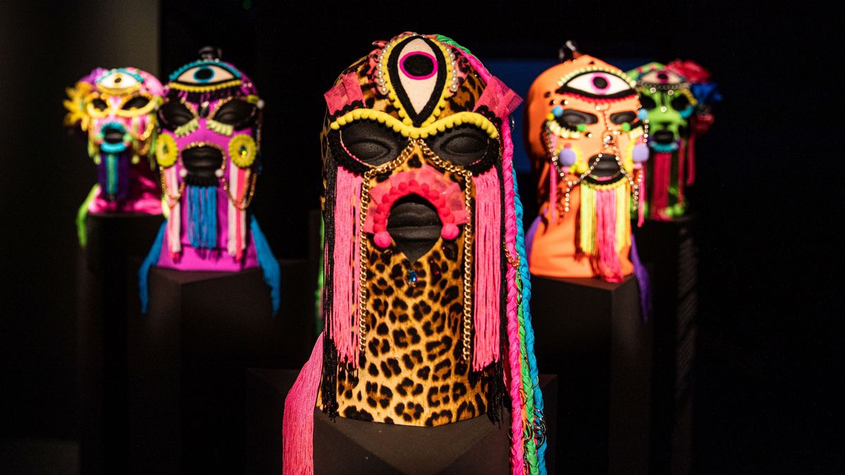 Photograph of hoods exhibited in the exhibition "La Máscara nunca miente" (The Mask Never Lies).