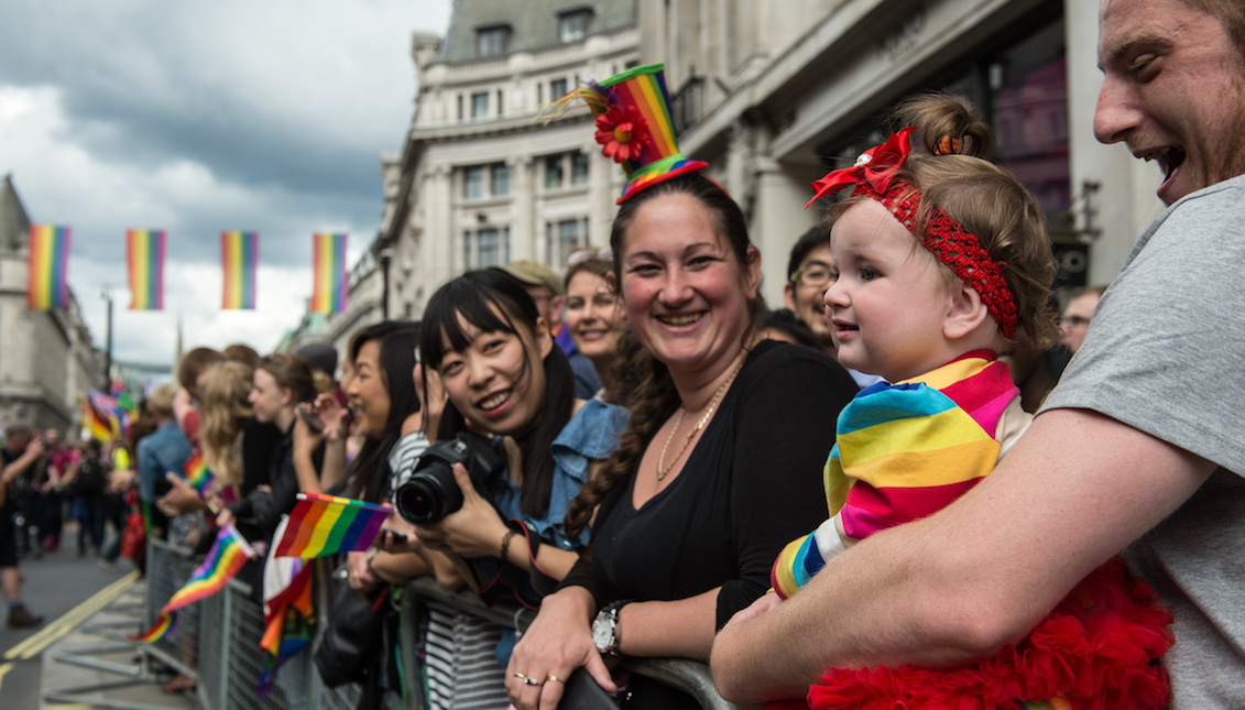 LONDON, ENGLAND - JUNE 25: Daisy Thwait, 1, watches the Pride parade with her father as the LGBT community celebrates Pride in London on June 25, 2016, in London, England. (Photo by Chris J Ratcliffe/Getty Images)​​​​​​​