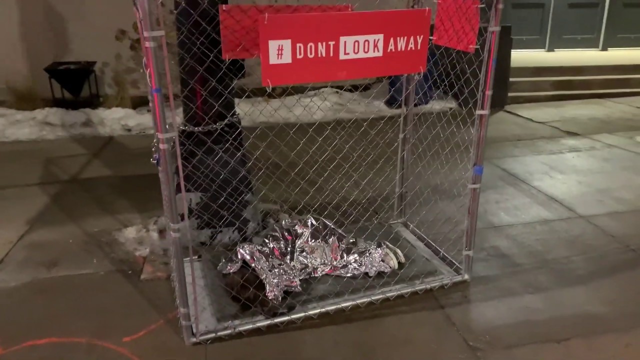 One of the more than a dozen cage installations put up by RAICES to greet Iowa caucus-goers in Des Moines, Iowa. Photo: RAICES.