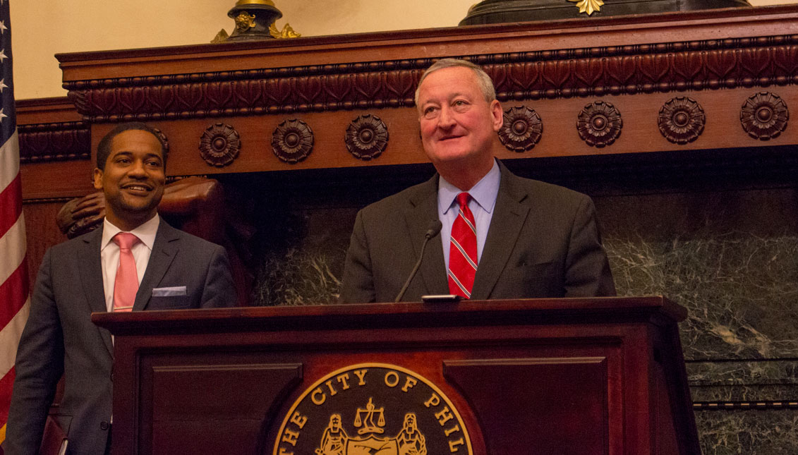 Mayor Jim Kenney and City Solicitor Marcel Pratt speak at a press conference at City Hall on Wednesday about the federal ruling which found the Department of Justice's conditions used to deny the city of federal funding due to Philadelphia's welcoming policies for immigrants to be unconstitutional. Photo: Emily Neil / AL DÍA News