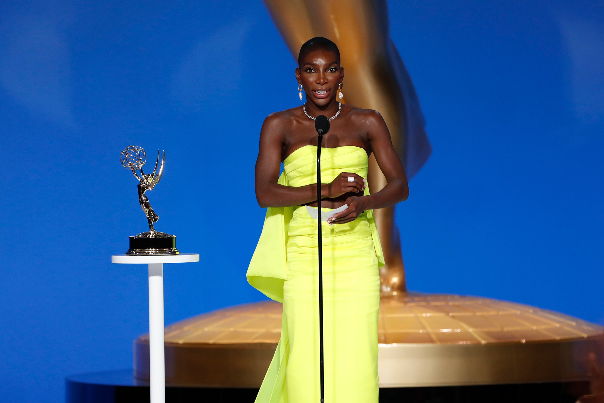 Michaela Coel acknowledging the award for Best Screenplay at the Emmys.