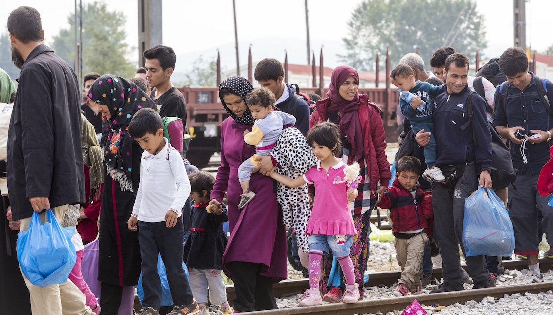 Idomeni, Greece - September 24, 2015: Hundreds of immigrants on the border between Greece and Macedonia, waiting for the right time to continue their journey through unguarded points. Photo: VASILIS VERVERIDIS