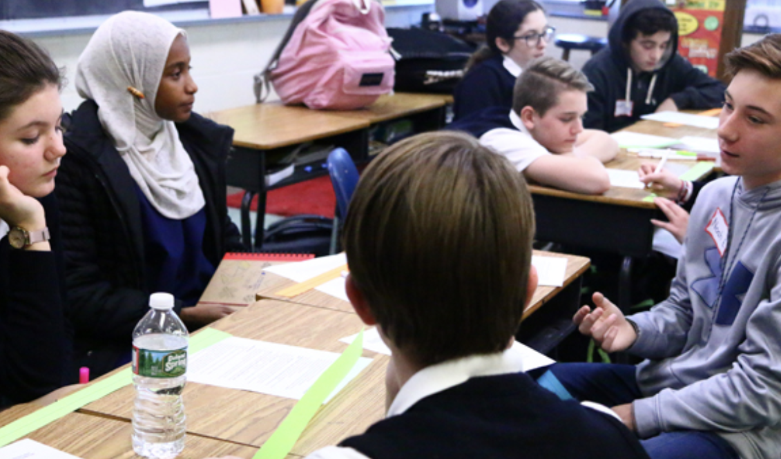 students from Muslim, Jewish and Catholic schools in Philadelphia discuss what they're learning about other faith traditions. Photo: Sarah Webb