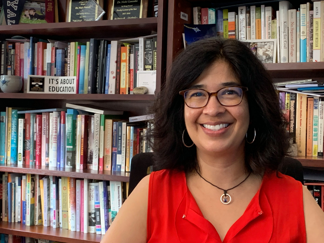 Historian Nicki Gonzales in her office at the University of Denver, photo by Kevin Simpson.