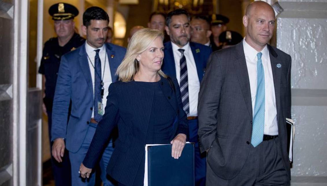 Secretary of Homeland Security Kirstjen Nielsen and White House Legislative Affairs Director Marc Short arrive at a meeting with President Donald Trump on Capitol Hill on Tuesday as Trump sought support from Congress for a Republican bill on immigration. | AP