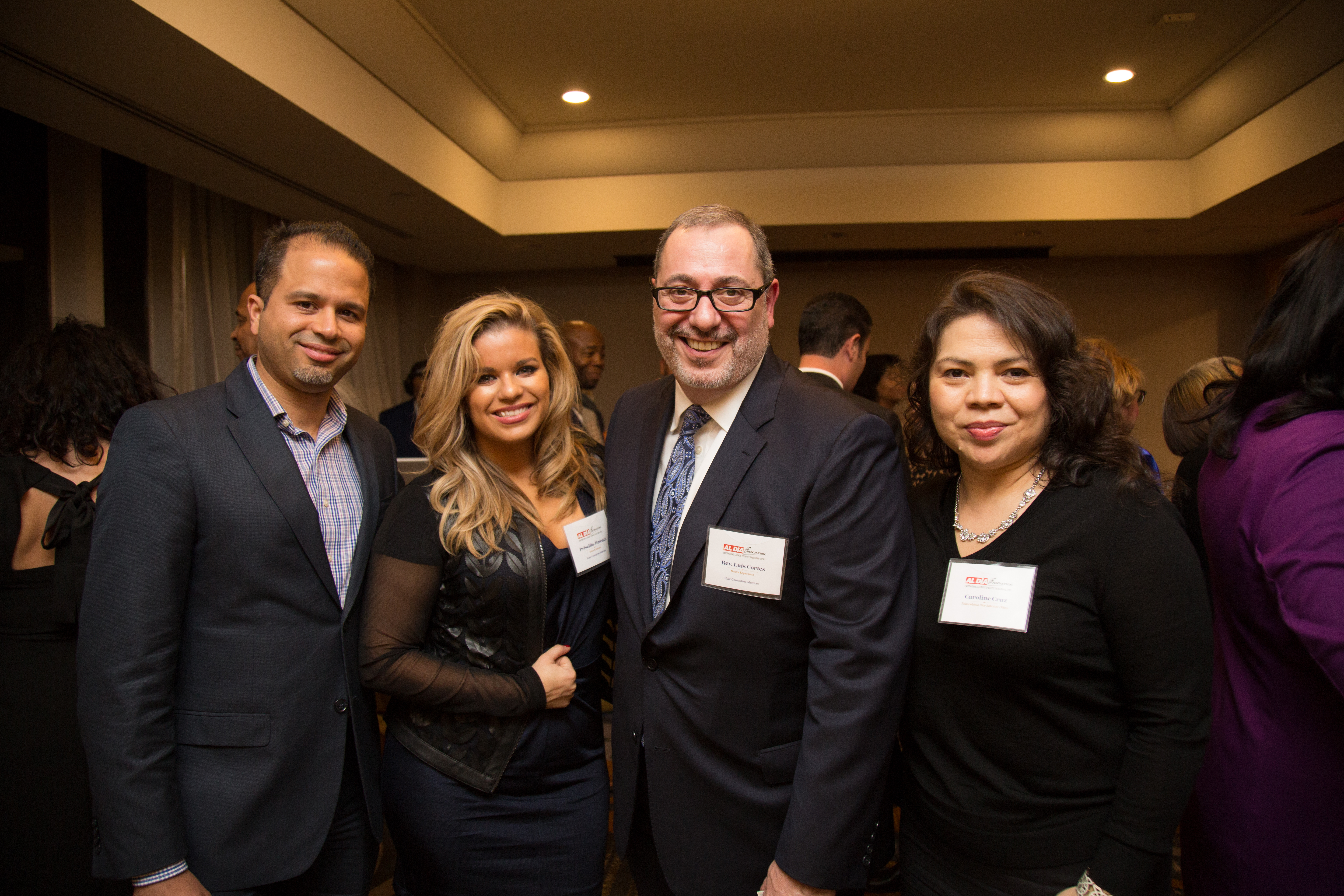 Jimmy Duran, Priscilla Jimenez, Luis Cortés, and Caroline Cruz. Photographed by Samantha Laub for AL DÍA News. 