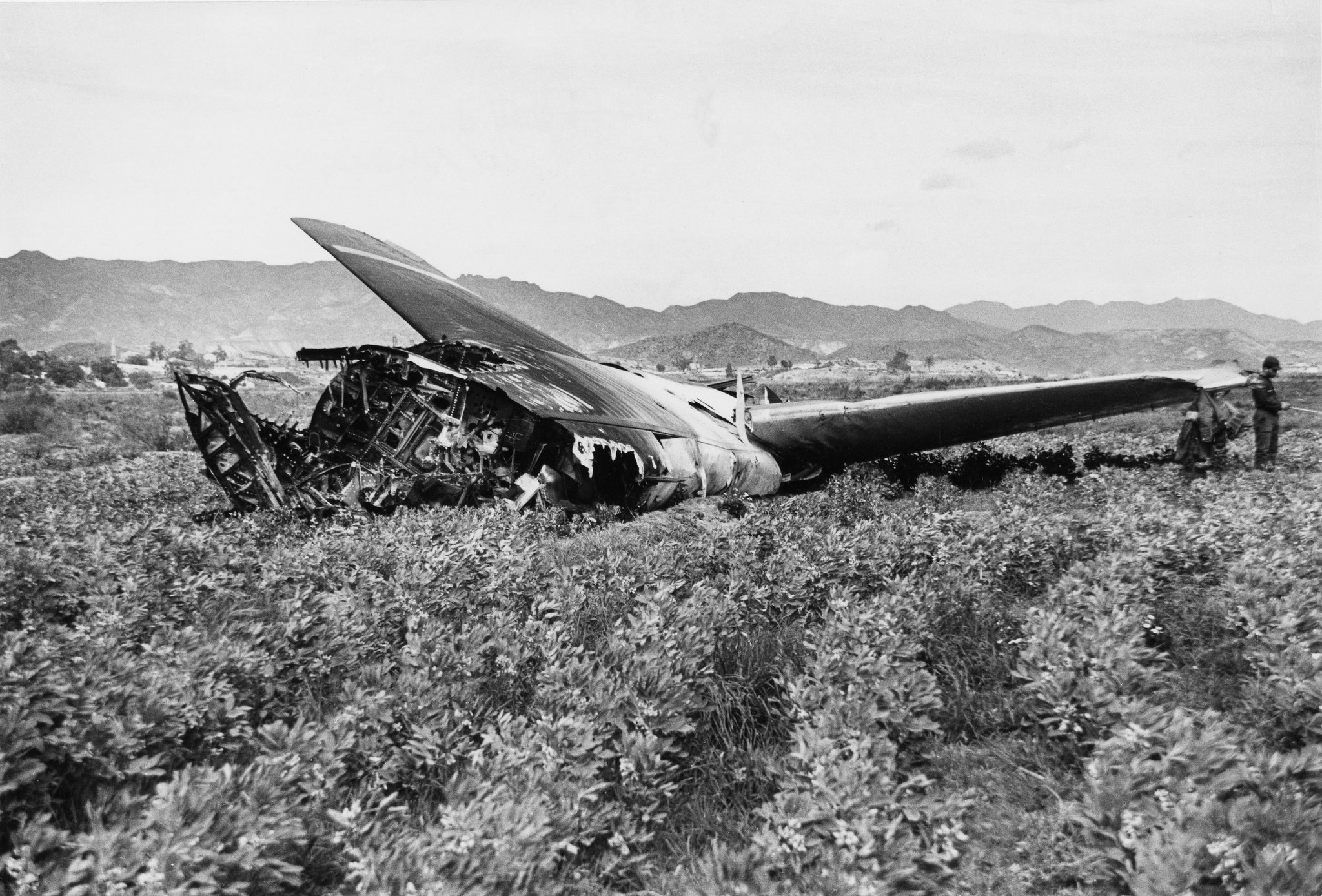 Wreckage of the B-52 bomber in Palomares, Spain during the winter of 1966. The aircraft was attempting to refuel with a KC-135 Stratotanker when a spark caused both planes to explode unloading four thermonuclear bombs onto the village below.  Photo: Kit Talbot / The New York Times