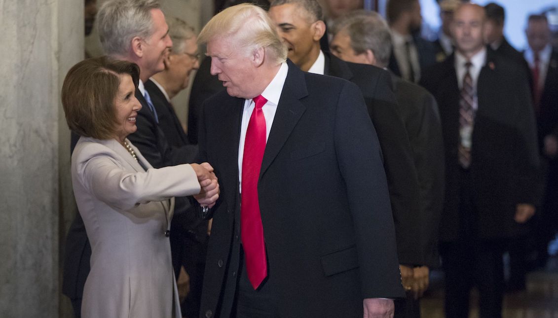 Nancy Pelosi and Donald Trump shake hands at Trump's inauguration in 2017. Photo: J. Scott Applewhite, Pool/Getty Images