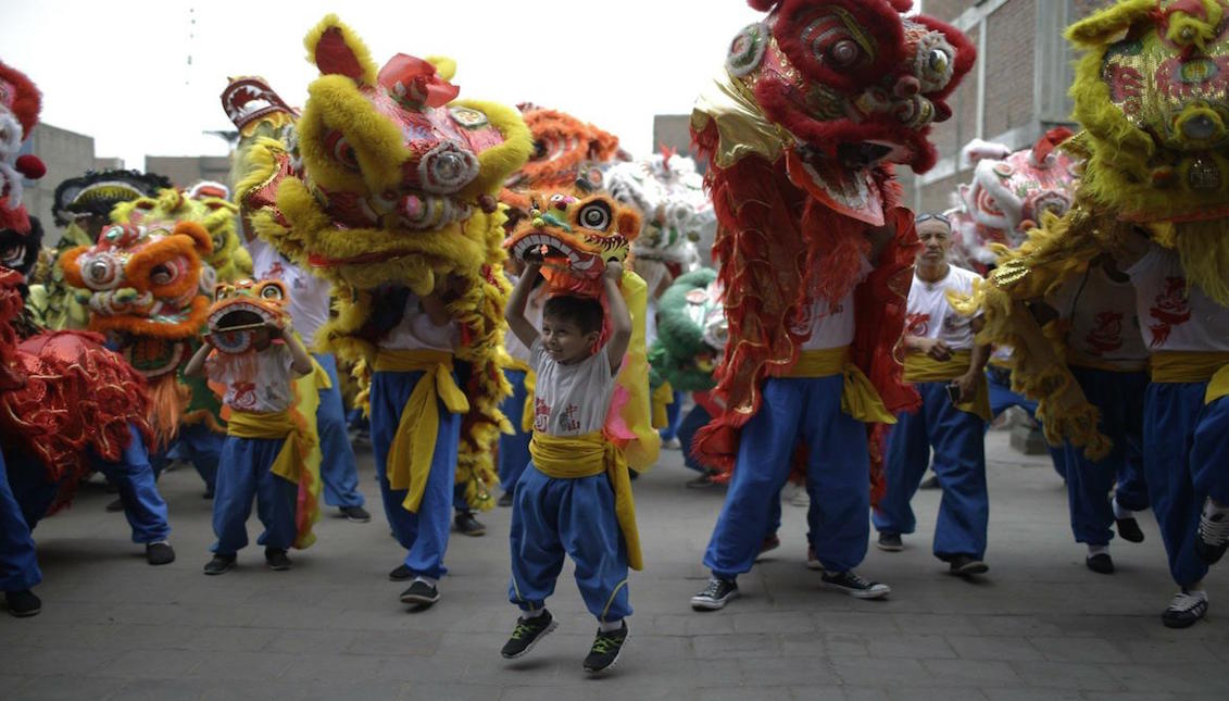 Lion dancers perform during the Chinese New Year celebrations in Lima, Peru. Photo: Martin Mejia/Associated Press