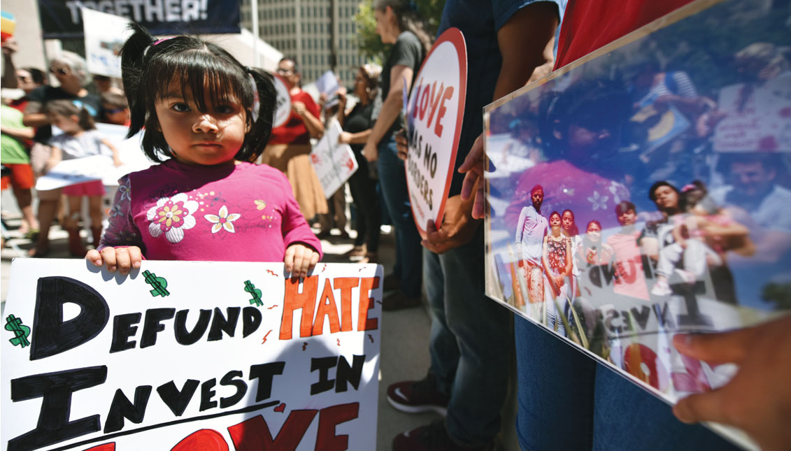 Amy Bautista (3) holds up a protest sign at the #CloseTheCamps United We Dream, American Friends Service Committee, and Families Belong Together led protests across the country at members of Congress's offices to demand the closure of inhumane immigrant detention centers that subject children and families to horrific conditions. (Photo by Tom Cooper/Getty Images for MoveOn.org Civic Action)
