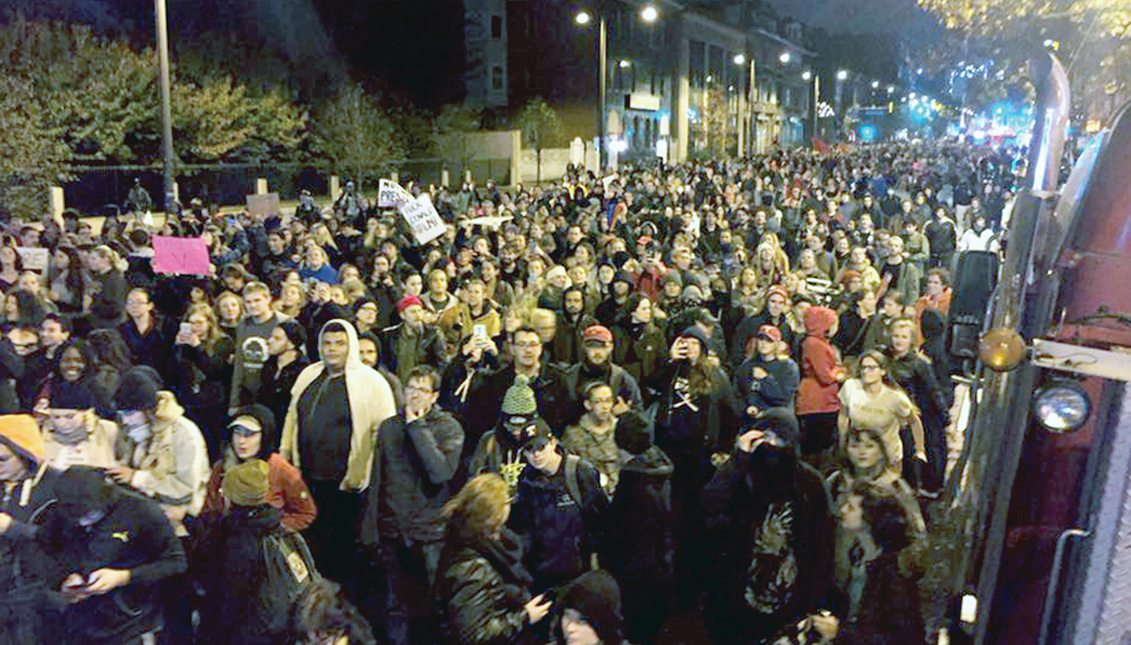 Demonstrators gathered in Thomas Paine Square, across from City Hall, to protest after Trump's election. Photo: Jamila Johnson / AL DÍA News