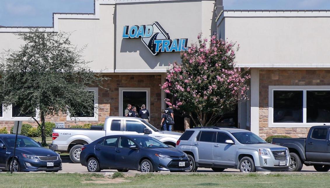 ICE agents at the Load Trail facilities. Source: The Paris News.