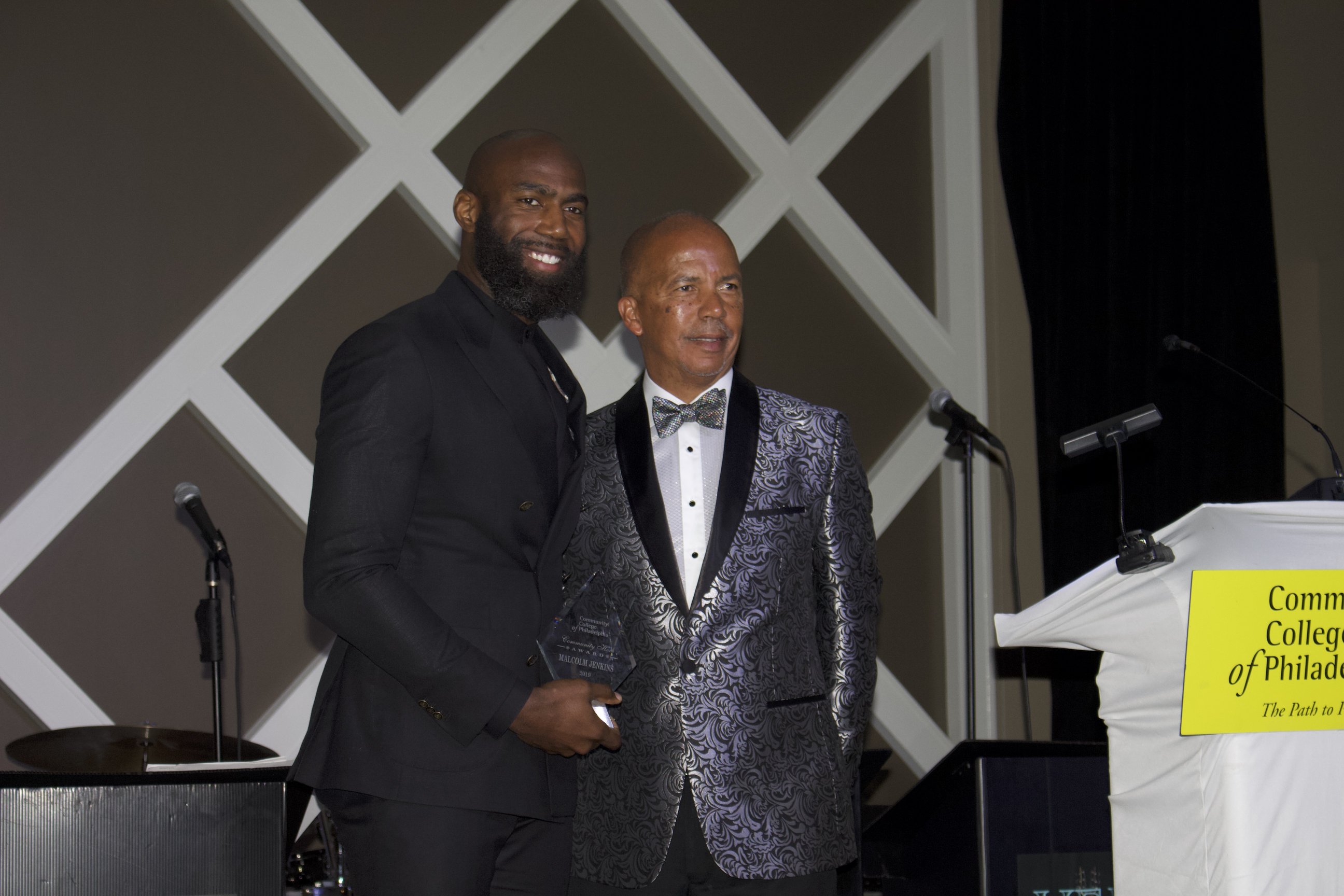 Community College of Philadelphia's Donald Generals with Philadelphia Eagles safety, Malcolm Jenkins. Photo: Jensen Toussaint