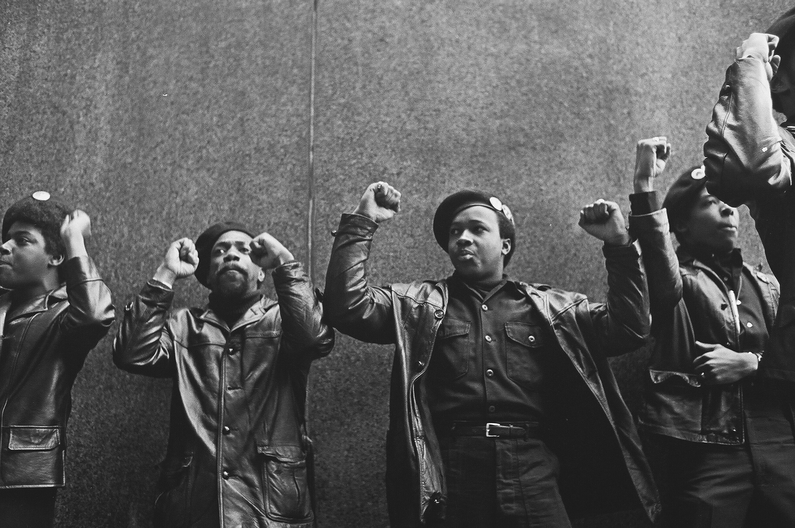 View of a line of Black Panther Party members as they demonstrate, fists raised, outside the New York County Criminal Court (at 100 Court Street), New York, New York, April 11, 1969. Photo: David Fenton/Getty Images.