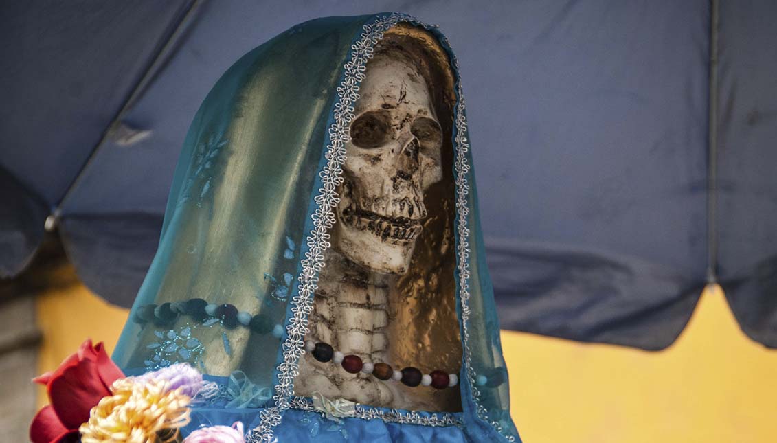 The Mexican Enriqueta Vargas, a quesadillas seller, celebrated the first Santa Muerte ceremony in 2001. Getty Images.