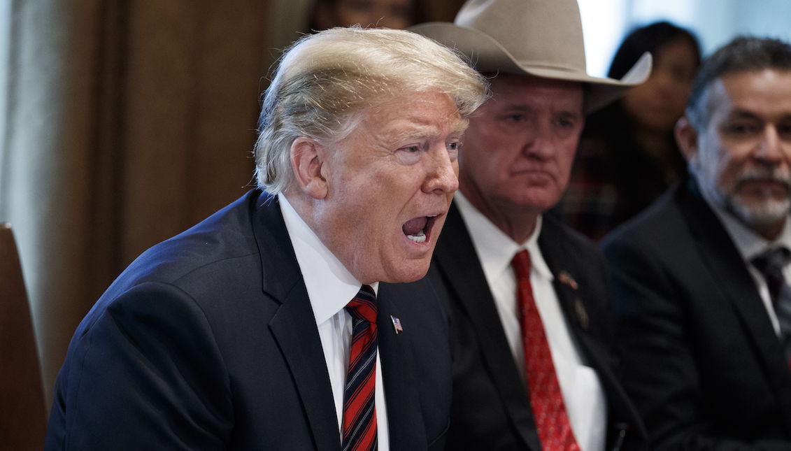 U.S. President Donald J. Trump (L) and Jackson County Sheriff AJ Louderback (R) participate in a roundtable discussion on border security on January 2019. The partial government shutdown, which is tied for the longest in U.S. history, has affected about 800,000 federal workers. EFE/EPA/SHAWN THEW