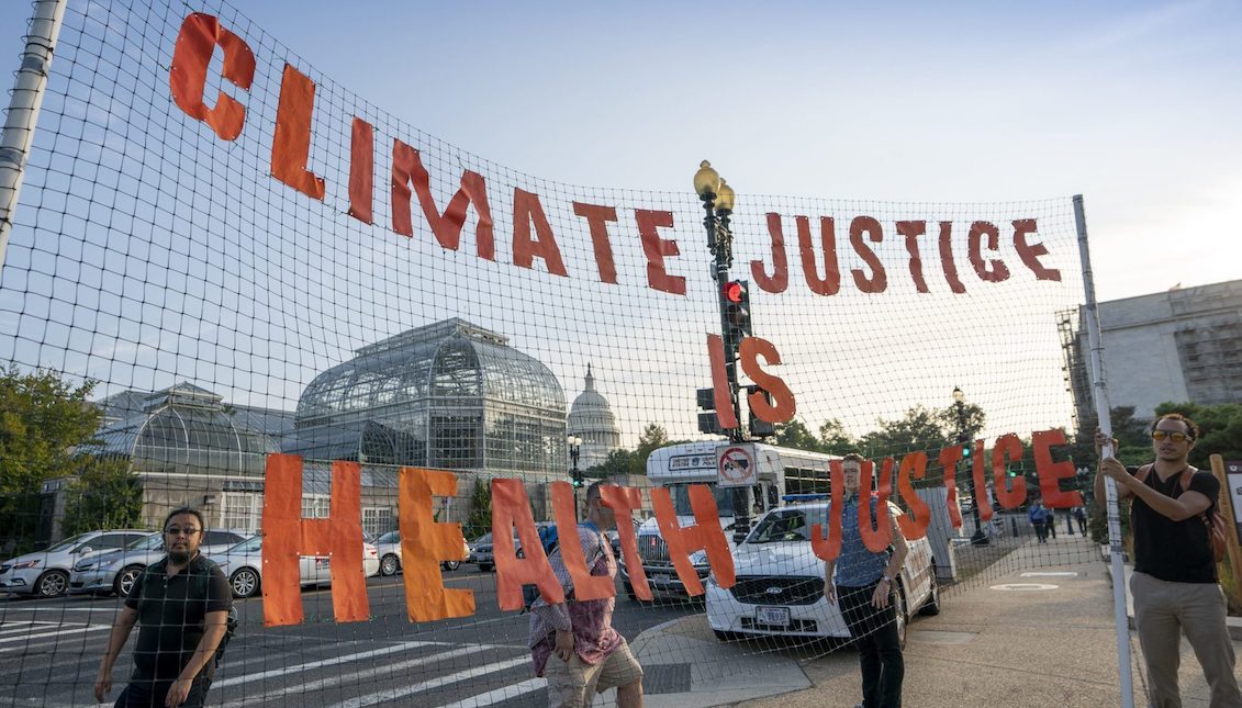 Climate activists participate in a ‘Shut Down DC’ protest to urge action on the climate crisis, on Independence Avenue near Capitol Hill in Washington, Monday, Sept. 23, 2019. (AP Photo/J. Scott Applewhite) (AP/J. Scott Applewhite)