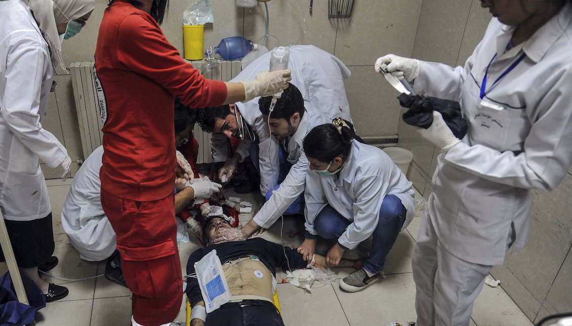 Photo courtesy of the Syrian Arab news agency (SANA) shows that wounded Syrians receive first aid in an emergency room at the Al Mouwasat Hospital, Damascus, Syria, on April 7, 2018. EFE