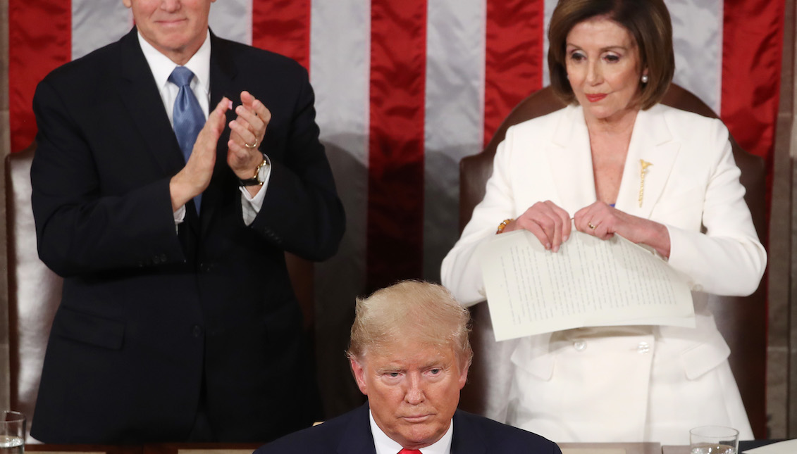 WASHINGTON, DC - FEBRUARY 04: House Representative Nancy Pelosi (D-CA) tears out pages from the State of the Union address after U.S. President Donald Trump finishes his State of the Union address in the U.S. House of Representatives on February 4, 2020 in Washington, DC. (Photo by Mark Wilson/Getty Images)