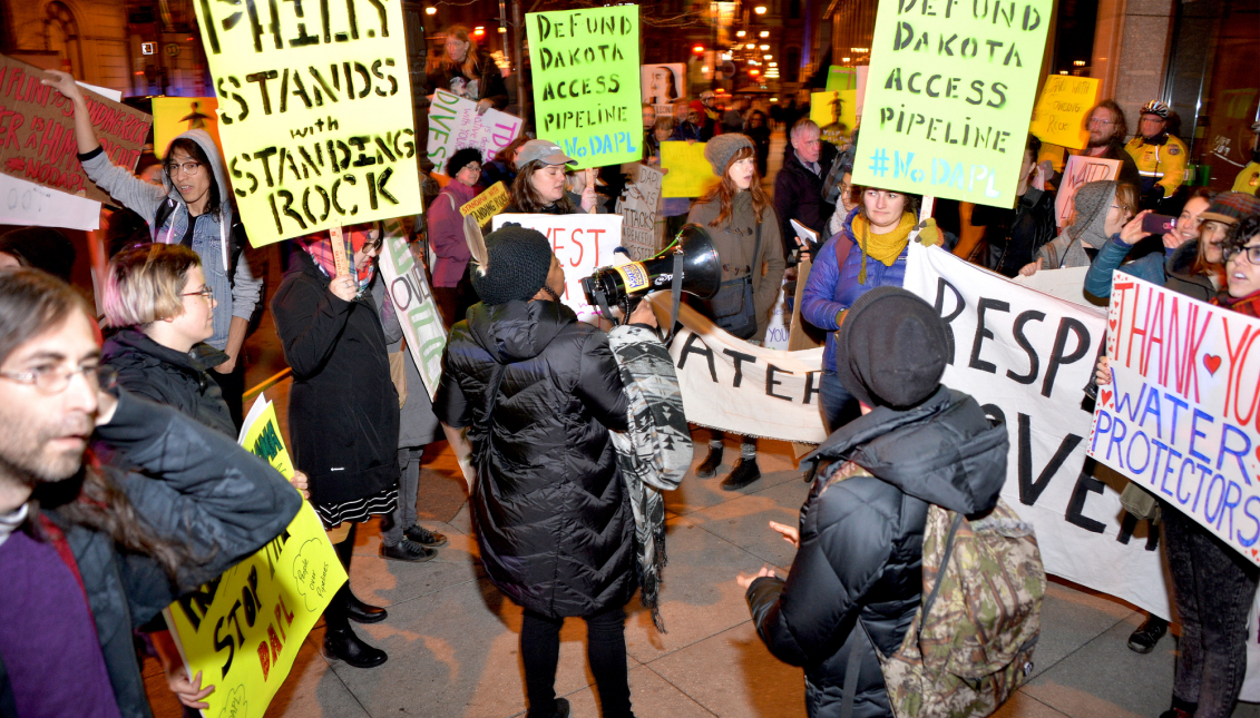 Protesters gather outside of TD Bank to demand divestment in Dakota Access Oil Pipeline. Photo: Peter Fitzpatrick/AL DÍA News.
