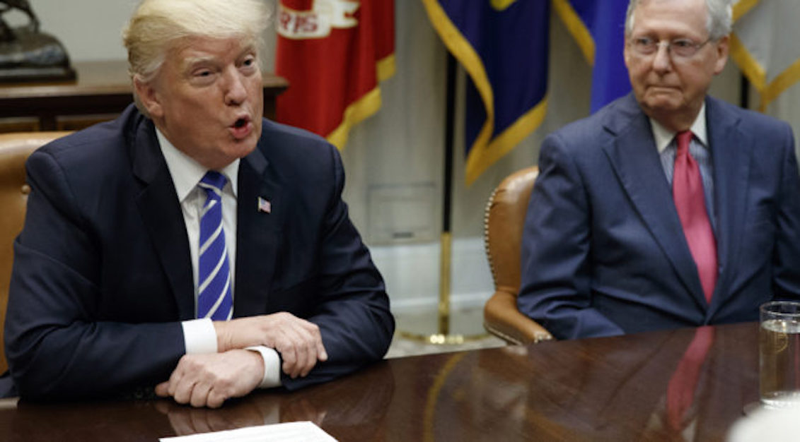 President Donald Trump (L) and the leader of the Republican majority in the Senate, Mitch McConnell (R). Evan Vucci / AP