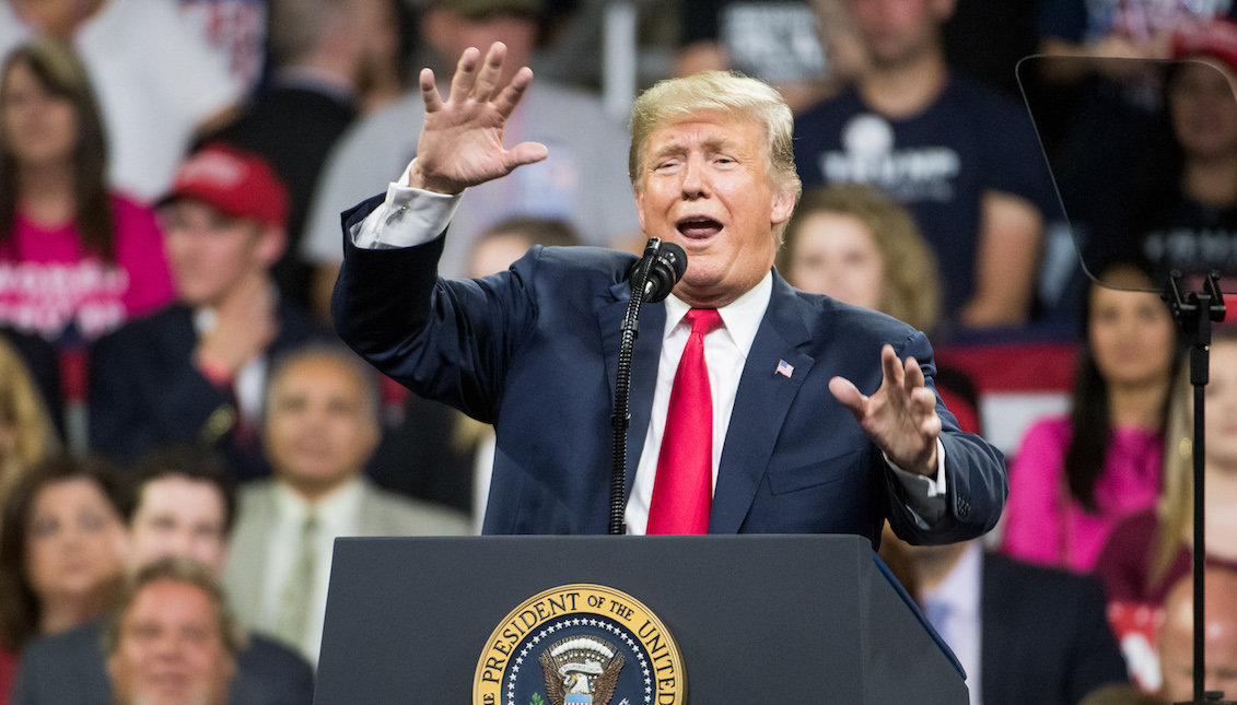 President Donald Trump mocks the testimony of Dr. Christine Blasey Ford during a political rally.