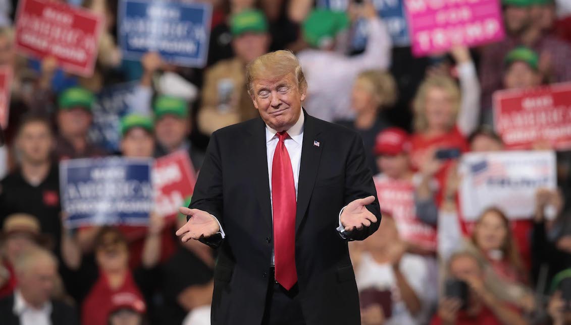 U.S. President Donald Trump speaks to supporters at a campaign rally at the Mid-America Center on October 9, 2018 in Council Bluffs. Iowa The rally is one of several Trump has scheduled recently in support of Republican candidates running in the upcoming midterm election. (Photo by Scott Olson/Getty Images)