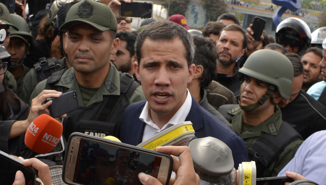 CARACAS, VENEZUELA - APRIL 30: Venezuelan opposition leader Juan Guaidó, recognized by many members of the international community as the country's rightful interim ruler, talks to media outside the airforce base La Carlota on April 30, 2019 in Caracas, Venezuela. (Photo by Rafael Briceno/Getty Images)