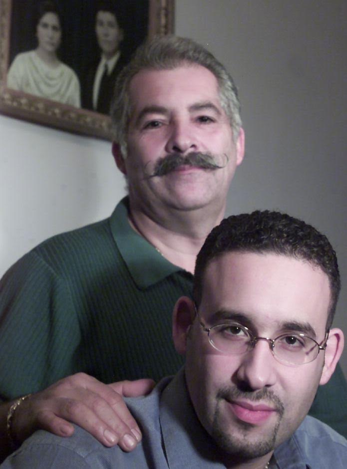 Cardona with his father, Héctor Cardona. Both parents and grandparents of the secretary are originally from Aguada, Puerto Rico. 