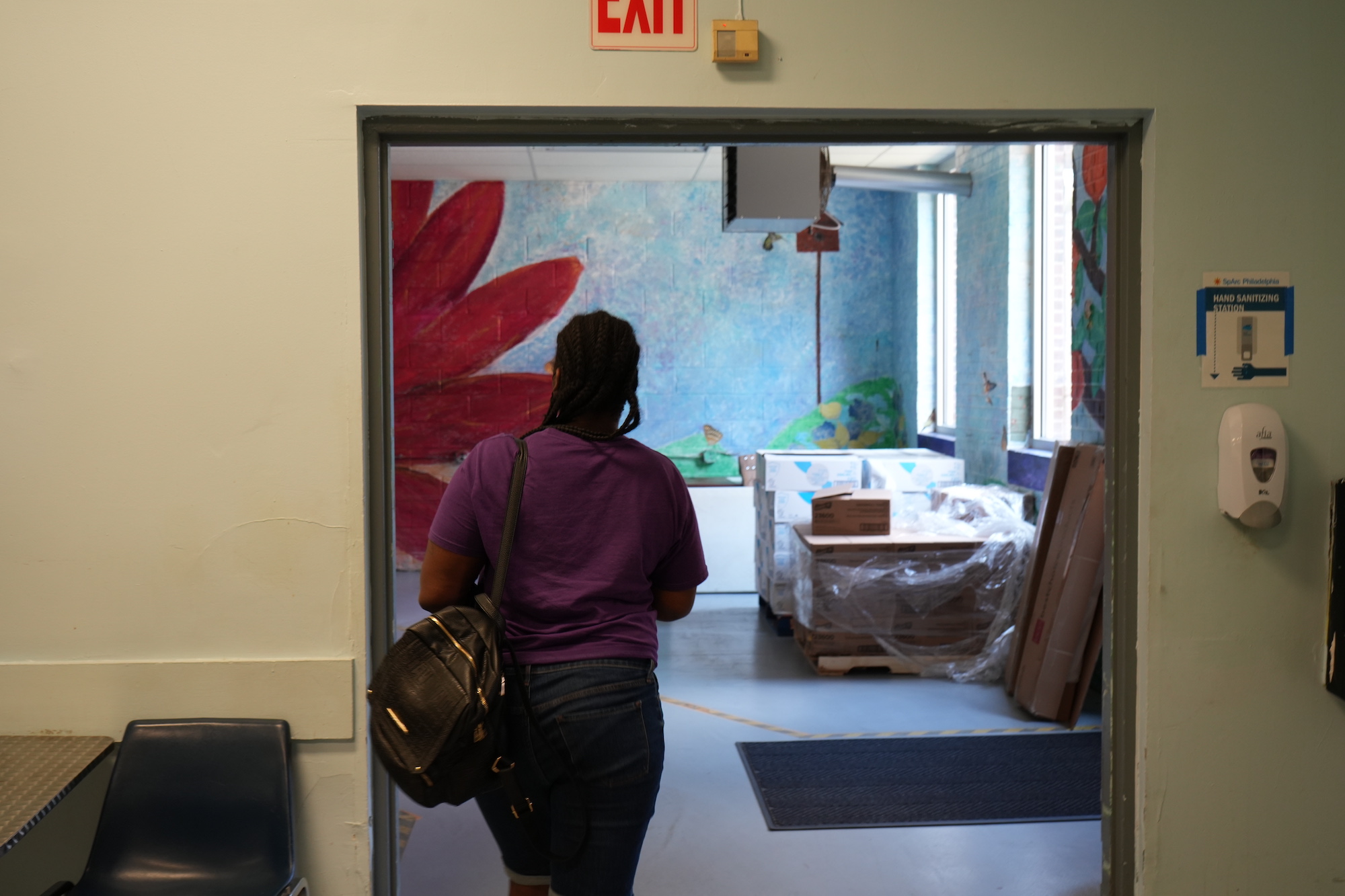 Pictured: Program participant Hakimah gives a tour of the premises