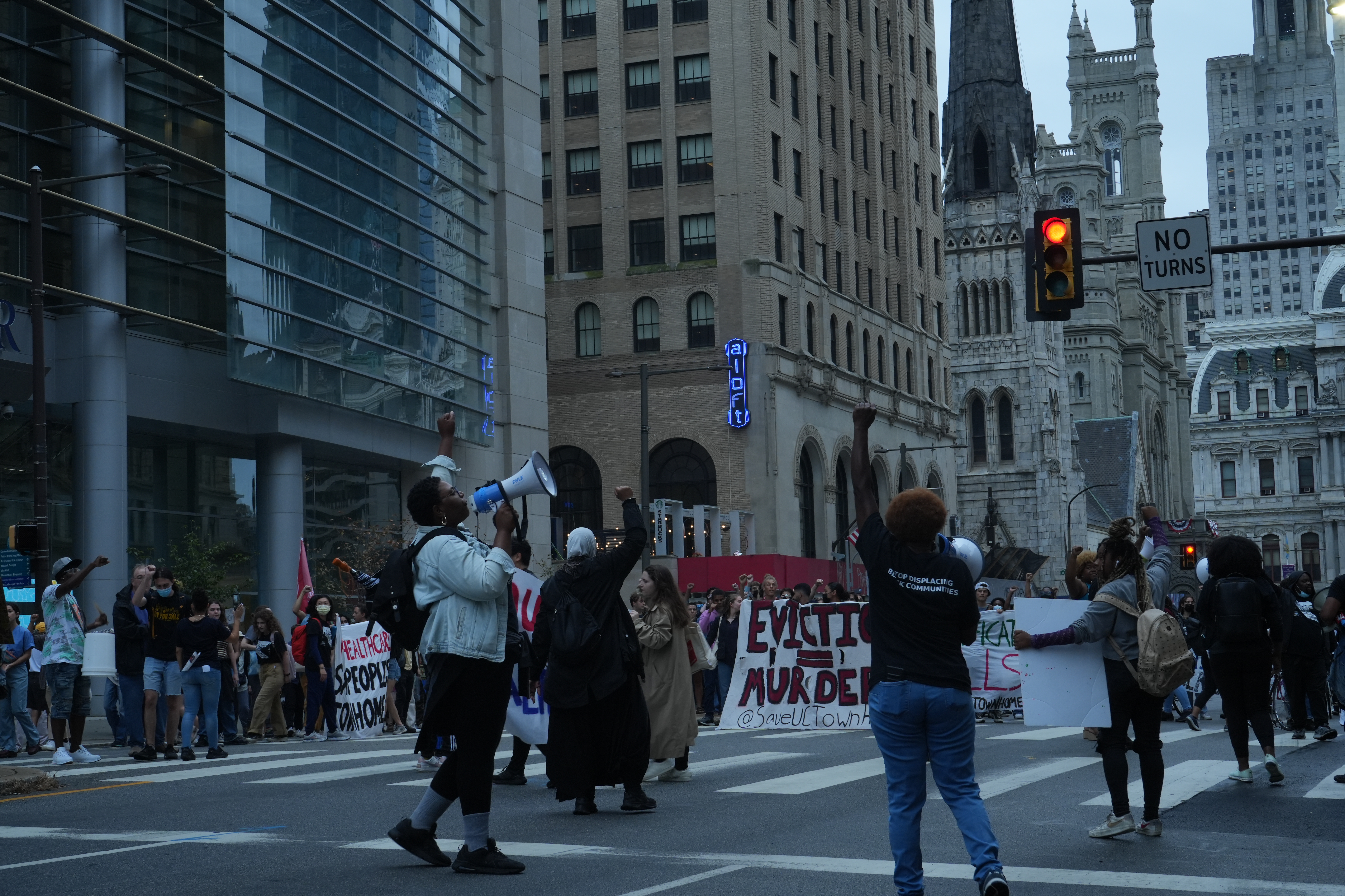 Pictured: UC Townhomes protesters march through JF Kennedy